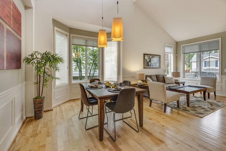 Dining area beside bay windows