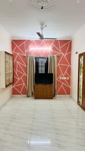 Ramalinganagar Home – Living room with TV