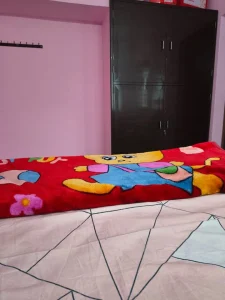 Meena’s Guest Home, Pathukannu – Bed and wardrobe
