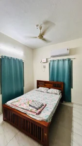 Ramalinganagar Home First Floor – Bedroom one with air conditioning