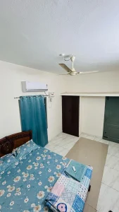 Ramalinganagar Home First Floor – Bedroom with air conditioning